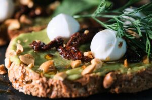 gourmet toast with avocado and mozzarella